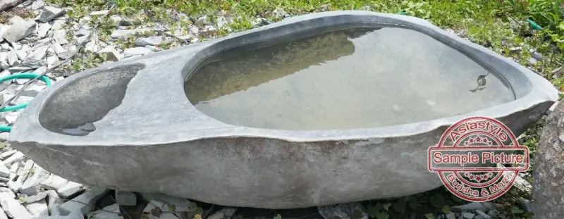 Product image 1 of the product “Riverstone basin, natural surface, polished inside. Dia approx 121-130cm Height 41-50cm ”